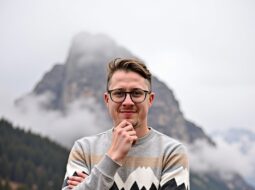 Contemporary casual headshot of Dr Connor Robertson outdoors