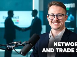 Business professionals networking at a trade show booth